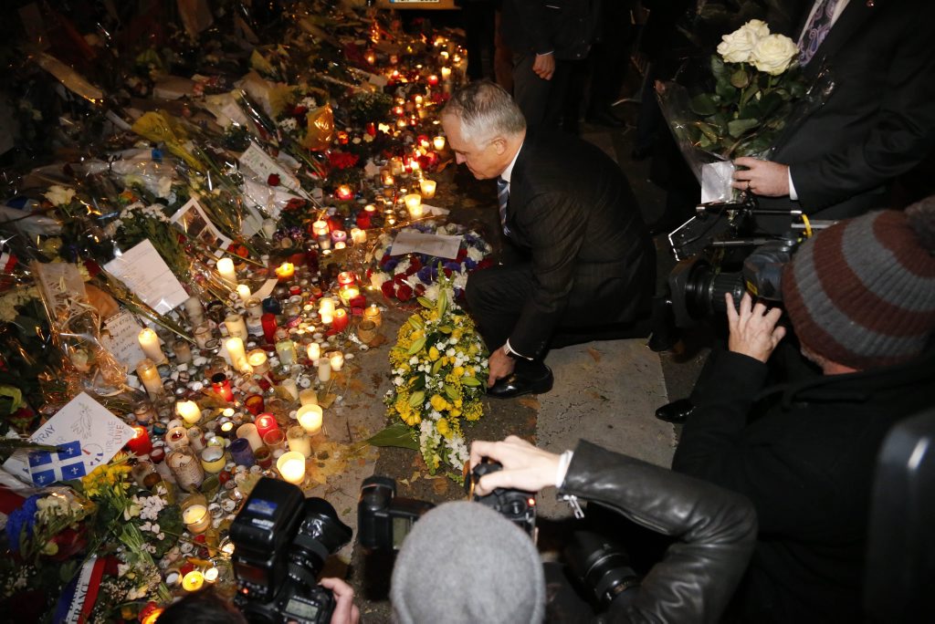 Australia's Prime Minister Malcolm Turnbull pays a tribute to the victims of Paris' terrorist attacks in front of the Bataclan concert hall in paris on November 29, 2015 in Paris. Malcolm Turnbull is in Paris to take part in the UN conference on climate change (COP21). AFP PHOTO / MATTHIEU ALEXANDRE Australia's Prime Minister Malcolm Turnbull pays a tribute to the victims of Paris' terrorist attacks in front of the Bataclan concert hall in paris on November 29, 2015 in Paris. Malcolm Turnbull is in Paris to take part in the UN conference on climate change (COP21). AFP PHOTO / MATTHIEU ALEXANDRE